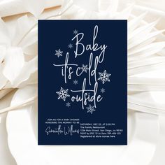 a blue and white baby it's cold outside card with snowflakes on it