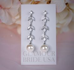 "Crystal pearl bridal earrings. Gorgeous long wedding earrings for bride or bridesmaids. Matching necklace and bracelet will complete your bridal jewelry set. This wedding jewelry set is available in silver, gold or pink gold(rose gold) color to match your dress.  They measure about 1 1/2\" long and 1/2\" wide. Matching bracelet is measuring: 7\" long and 1/4\" wide. High quality guaranteed by GlamourBrideUSA! SHIPPING: Standard Shipping: 4-6 business days Priority mail Shipping: 2-3 business da Silver Pearl Drop Earrings For Bridal Shower, White Dangle Bridal Earrings For Bridesmaid, White Drop Earrings For Bridesmaids, White Bridal Earrings For Bridesmaids With Matching Set, Pearl Drop Bridal Earrings For Bridal Shower, Bridal Jewelry Pearl, Pearl Teardrop Earrings, Teardrop Earrings Gold, Pearl Bridal Earrings