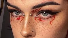 Red Liner Makeup, Flame Eye Makeup, Red And Black Eyeliner, Flame Eyeliner, Fire Eyeliner, Red And White Makeup, Red Eyeliner Looks, Cool Eyeliner Ideas, Red Graphic Liner