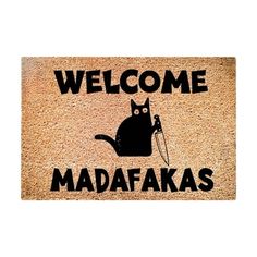 a welcome mat with a black cat and the words'welcome madafaks '