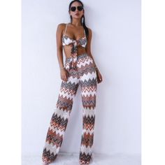 Beverly Hills Boutique New 2 Pc Set Designer Chevron Print Co-Ord Set Tie Front Crop Top Flare Pant Set 2 Piece Set Condition: New With Tags Sizes: Xs, S, M, Or L Color: Black, White, Multi Details; Tie Front Crop Top Flared Pant 2 Piece Co Ord Set Ships From Beverly Hills, Ca 90210 Comes Gift Wrapped White Two-piece Bottoms For Vacation, White Wide Leg Beach Sets, Trendy Two-piece Bottoms For Vacation, Formal Romper, Burgundy Jumpsuit, Light Pink Shorts, Halter Romper, Jumpsuit Dressy, Front Crop Top