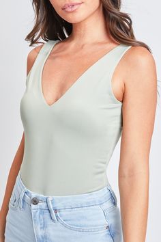 Feel flirty, fun, and fabulous in our Women’s Take the Plunge Bodysuit. Constructed with two layers of soft, stretchy fabric for a comfortable and flattering figure-hugging silhouette. Detailed with a V-shaped plunge neckline and a matching V-shaped plunge in the back for the perfect amount of sexy. Finishes with a thong bottom and two snap button closures. Style with your favorite YMI denim and heeled sandals for a baddie look that’ll last from day to night! Product Details:- Sleeveless - Doubl Firework Colors, Plunge Bodysuit, Ymi Jeans, Hugging Silhouette, Sage Color, Plunge Neckline, Mauve Color, Charcoal Color, Black Bodysuit