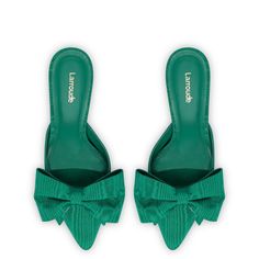 An ode to vintage slippers, the Mini Elle Pump is provocative and prim all at once. With a hand-knotted bow, they're sweet up front with a sexy heel at last glance. Emerald Green Heels, Vintage Slippers, Emerald Fabric, Hot Stamp, Short One Piece, Stamp Logo, Fab Shoes, Pointed Pumps, Mid Heels Pumps