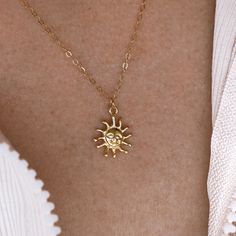 Embrace the suns warmth wherever you go ☼ Dainty sun charm necklace. ✧ 14k gold filled chain  Measurements:  ✧ Length of Chain: approx. 16 inches Sun Choker Necklace, 14k Gold Sun Design Jewelry Gift, Sunburst Shaped Jewelry As Summer Gift, Sun-shaped Necklace For Summer Gifts, Summer Sunburst Jewelry Gift, Sunburst Shape Summer Gift Jewelry, Dainty Sun And Moon Design Charm Necklaces For Everyday, Everyday Dainty Sun And Moon Charm Necklaces, Dainty Sun And Moon Design Charm Necklaces