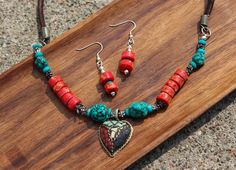 Turquoise & Coral Tibetan Nepalese Tribal Style Boho Necklace - set Handmade In Tibet  - Traditional Unique Hand Crafted Jewellery Turquoise & Coral Tribal Style Boho Necklace  Traditionally Handmade In tibet Our hand crafted sustainable turquoise necklaces have been made in Tibet  for centuries. The heritage of this stunning jewelry is found in modern day Nepal, Tibet, Bhutan & Northern India. Sourced from the turquoise of the Himalayan mountains, in this culture everything keeps you connected Handmade Bohemian Turquoise Jewelry Sets, Handmade Turquoise Bohemian Jewelry Sets, Bohemian Turquoise Jewelry Sets For Gifts, Traditional Turquoise Jewelry Sets As Gift, Traditional Turquoise Jewelry Set For Gift, Adjustable Turquoise Bohemian Jewelry Sets, Bohemian Jewelry Sets With Round Beads For Festivals, Multicolor Adjustable Traditional Turquoise Necklace, Turquoise Necklaces