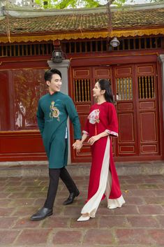 🌿 This set includes traditional Ao Dai Style: Modern Material: Very well made with high-quality  silk Collar: traditional collar Men dress: Ao Dai Top Women's Dress: Ao Dai and Pants Please provide bust-waist-and hip measurements when placing your order to ensure the best fit for you. 🌿 NOTE: * Recommend gentle washing * Please contact us for any inquiries about size. We don't have an exchange policy for the wrong size * It is safe for a washer and dryer in a "delicate" setting. * Actual Ao Dai colors may differ up to 10% due to lightning and viewing devices. * These ao dai pants are made based on Vietnamese size; they will run smaller than American size. *3D printed ao dai: you may see some white broken fabric around the seam (collar). *There might be some chalk/ pen writings on the fab Traditional Embroidered Ao Dai For Ceremony, Embroidered Traditional Ao Dai For Ceremonies, Traditional Long Sleeve Wear For Ceremony, Traditional Long Ao Dai For Ceremonial Occasions, Red Traditional Ao Dai For Ceremonies, Traditional Fitted Wear For Marriage, Traditional Ceremonial Ao Dai For Festive Occasions, Traditional Red Ao Dai For Ceremonies, Fitted Traditional Wear For Marriage