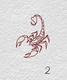 a drawing of a scorpion on paper with the number two drawn in front of it