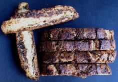 several pieces of bread sitting next to each other on a blue surface