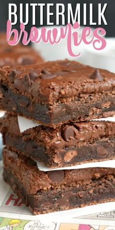 three chocolate brownies stacked on top of each other with the words buttermik brownies above them