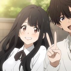 two anime characters giving the peace sign