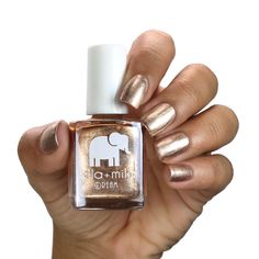 The perfect metallic gold DREAM Collection Nail polish bottle 13.3 ml - 0.45 fl oz | ingredients "17-Free" products do not contain: Acetone, Animal-Derived Ingredients, Bisphenol-A, Camphor, Ethyl Tosylamide, Formaldehyde, Formaldehyde Resin, Gluten, Glycol Ether of Series E (Gycol ethers derived from ethylene oxide), Nonylphenol Ethoxylate, Parabens, Phthalates (including DBP), Styrene, Sulfate, Toluene, Triphenyl Phosphate (TPHP/TPP), Xylene Vegan Animal cruelty-free Quick Dry Chip Resistant M Ella Mila Nail Polish, Metallic Gold Nail Polish, Nail Polish Bottle, Gold Nail Polish, Clean Cosmetics, Nail Polish Brands, Gold Nail, Nail Polish Bottles, Vegan Animals