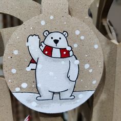 an ornament with a polar bear on it