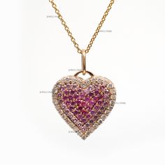 Pink sapphire with diamond heart pendant gold | Natural pink sapphire ombre pave heart pendant gold | Pink sapphire diamond pendant gold GEMSTONE DETAILS : ✦ Gemstone : Pink Sapphire ✦ Gemstone Type : Natural ✦ Gemstone Size : 1.50-1.60 MM ✦ Gemstone Shape : Round ✦ Gemstone Weight : 0.50 Carats ✦ Gemstone Grade : AAA DIAMOND DETAILS : ✦ Diamond Type : Natural ✦ Diamond Size : 1.50 mm ✦ Diamond Color : F-G ✦ Diamond Clarity : Slightly included ✦ Diamond Cut : Excellent - Very Good ✦ Diamond Weight : 0.25 Carats METAL DETAILS : ✦ Metal : 14K/18K Gold ✦ Metal Color : Yellow / White / Rose Gold ✦ Setting : Pave Setting ✦ Ring Box : Yes SHIPPING DETAILS : ✦ Shipped via : UPS ✦ Production time : 10-12 days ✦ Delivery time : 7-8 days ✦ Expedited shipping : Available ✦ Expedited shipping service Elegant Heart-shaped Pink Sapphire Jewelry, Pink Diamond Heart Cut Necklace, Sapphire Heart Pendant Necklaces For Valentine's Day, Sapphire Heart Pendant Necklace For Valentine's Day, Fine Jewelry Diamond Heart Necklace With Gemstone, Heart-shaped Diamond Necklace With Gemstone, Diamond Heart Necklace With Gemstone, Pink Heart-shaped Diamond Necklace, Heart-shaped Sapphire Jewelry For Valentine's Day