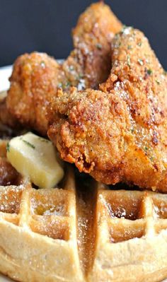 fried chicken and waffles on a white plate