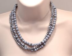 Smoky Grey Collar Necklace, 3 Strand Gray Gunmetal Crystal Necklace, Layered Statement Necklace, Wedding Jewelry, Pearl Jewelry Gift Three strand 6 & 8mm grey glass, 6mm grey glass pearls, gunmetal crystal accent. Lobster claw clasp closure. 18" in length.  #N516 Wanna See More? Click below for other items available: http://www.etsy.com/shop/StudioMJewelry Shipping: All jewelry pieces are ready to ship. Items are shipped to your Etsy address, via USPS First Class mail with tracking and delivery Statement Necklace Wedding, Pearl Jewelry Gift, Necklace Layered, Jewelry Pearl, Necklace Wedding, Grey Glass, Multi Strand Necklace, Strand Necklace, Collar Necklace