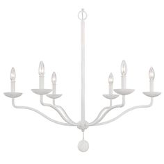 a white chandelier with five lights hanging from it's center point and four arms