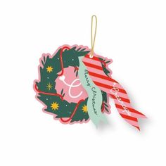 a christmas ornament hanging from a string on a white background with stars and stripes