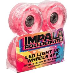 two pink skate wheels in plastic packaging on a white background with the words impala rollerskate