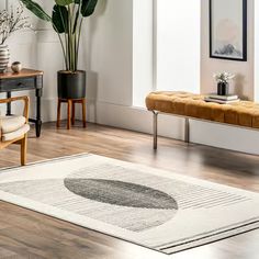 a living room filled with furniture and plants