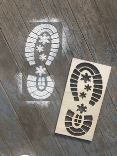 a skateboarder is standing next to an imprint on the ground