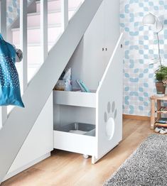 the stairs are white and have paw prints on them in this child's room