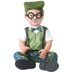 a baby dressed up as a nerd with glasses and a mustache sitting on the ground