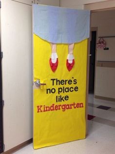 there's no place like kindergarten sign on the door to an open classroom area