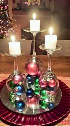 wine glasses upside down with ornaments as candles