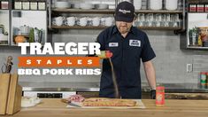 a man standing in front of a cutting board with meat on it and the words traeger staples bbq pork ribs