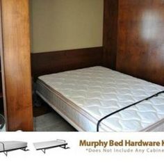 there is a bed with no sheets in the room, and two mattresses are next to each other