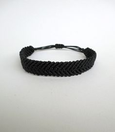 Black Men bracelet, Surf bracelet, Macrame bracelet, Chevron, Beach bracelet, Minimal, Unisex, Adjustable, Knotted jewelry, Water resistant A classic black bracelet for casual wear! This handknotted bracelet is made with black waxed string. It is adjustable and has a sliding knot closure in order to fit a lot of sizes. Due to its waxed threads,the bracelet is very durable and water resistant. Other black macrame bracelets: https://www.etsy.com/listing/228771179/men-braceletfriendship-braceletsur Black String Bracelet, Black Thread Bracelet, Handmade Black Bracelets With Waxed Cord, Black Macrame Jewelry For Friendship, Adjustable Black Macrame Bracelets, Iphone Lifestyle, Surf Bracelet, Sliding Knot Closure, Black Macrame