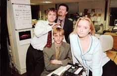 a group of people posing for a photo