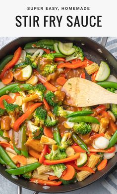 stir fry with broccoli, carrots and other vegetables in a skillet