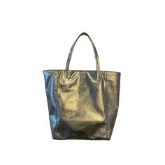 This large, genuine leather tote is treated in a beautiful metallic gold finish. Pair it with any outfit for a lavish pop! 18" W x 15" H Metallic Leather Bag For Shopping, Luxury Metallic Shoulder Bag For Daily Use, Chic Metallic Shopping Bags, Classic Gold Bag With Leather Lining, Luxury Metallic Tote Shoulder Bag, Classic Gold Bags With Leather Lining, Luxury Gold Shoulder Bag With Leather Lining, Luxe Gold Leather Bag, Elegant Metallic Soft Leather Bags