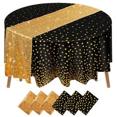 black and gold polka dot table cloths with matching placemats on wooden legs