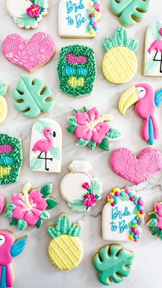 some decorated cookies are sitting on a table