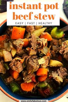 a bowl filled with meat and vegetables on top of a table