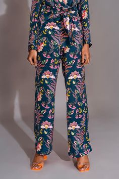 Blue jacket with a waist tie featuring all-over multi colored floral prints. Comes with straight-fit trouser and a solid spaghetti inner top. - Aza Fashions Blue Floral Print Bottoms For Workwear, Blue Floral Print Pants For Work, Multicolor Floral Print Workwear Pants, Multicolor Floral Print Pants For Work, Trouser Pattern, Floral Print Jacket, Trouser Co Ord, Printed Jacket, Luxury Sale