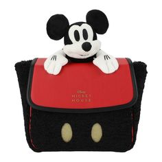 a mickey mouse purse with ears on it's head and the name mickey mouse