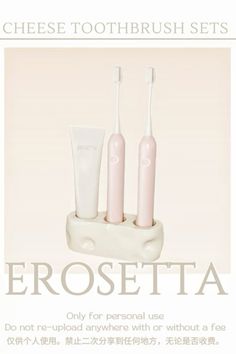 three toothbrushes sitting in a holder with the words eosetta on it