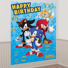 sonic the hedgehog and friends happy birthday poster on a wall in a room with wood floors