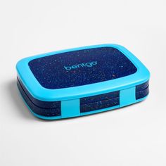 Make mealtimes more fun with this cleverly designed, hold-it-all Bentgor bento lunch box. On the outside, a colorful splash of confetti sparkles on a deep ocean-blue background. Inside, 5 portion-perfect compartments are sized to hold half sandwiches, fruits and veggies, and even dips like yogurt and hummus-all in a mess-free, leak-proof package. Slim and lightweight, this sturdy little box features 2 kid-friendly latches and a drop-proof design with durable rubber-coated edges. Plus, grown-ups Playful Blue Lunch Box Gift, Blue Rectangular Lunch Box For Back To School, Blue Lunch Box For Back To School Gift, Kids Bento, Blue Confetti, Salad Spinner, Backpack Gift, Kids Gear, Deep Ocean