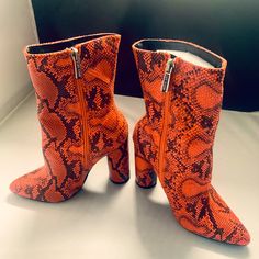 These Boa-Styled Print Cape Robbin Booties Are Some Ankle Boots Waiting For You! Size 6, Brand New, Never Worn Trendy Synthetic Ankle Boot Booties, Trendy Synthetic Ankle Booties, Trendy High Ankle Synthetic Booties, Trendy Fall Synthetic Booties, Fall High Heel Synthetic Booties, Fall Synthetic High Heel Booties, Trendy Synthetic Booties, Trendy Synthetic Booties With Block Heel, Trendy Orange Spring Boots