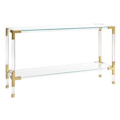 a glass and brass console table with two shelves on one side, against a white background