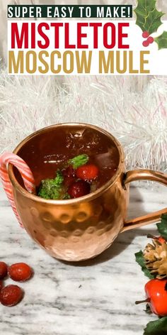 a copper mug filled with moscow mule and cherries