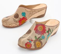 Step into a pair of these perforated leather clogs and let your personality bloom. The painted floral design adds a splash of color and artistry to every step. From L'Artiste by Spring Step. Multicolor Slip-on Clogs For Spring, Spring Leather Footbed Slip-on Clogs, Slip-on Clogs With Removable Insole For Spring, Multicolor Leather Clogs For Spring, Spring Slip-on Clogs With Rubber Sole, Multicolor Leather Clogs With Rubber Sole, L'artiste By Spring Step, Splash Of Color, Leather Clogs