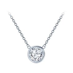 Chic and modern, this diamond solitaire pendant is bezel set with a sparkling round 1/3ct, 1/2ct, 3/4ct, or 1ct diamond. The diamond is H/I in color, and SI in clarity. Please select your desired carat weight below. Solitaire Diamond Necklace, White Gold Diamond Bracelet, Real Diamond Necklace, Diamond Solitaire Pendant, Round Diamond Earrings, Diamond Pendants Designs, Diamond Earrings Studs Round, Dainty Diamond Necklace, Diamond Solitaire Necklace