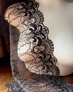 FOR ALL INTERNATIONAL CUSTOMERS, WE REQUIRE AN ACCURATE EMAIL ADDRESS AND PHONE NUMBER TO SHIP. PLEASE LEAVE IN NOTES AT CHECKOUT. THANKS SO MUCH!Beautiful quality European style lace ....  embroidered BLACK flowers on a fine COPPER colored nylon mesh backing, soft and lovely. There is NO STRETCH to this, other than the usual cross stretch nets typically have. Perfect for bras! * Listing is for one yard.   *Width is  about 9" LIMITED EDITION More lace, stretch lace, appliques, flowers, leaves an Fitted Black Sheer Lace, Sheer Black Lace For Party, Black Sheer Lace For Party, Black Sheer Lace For Evening, Black Scalloped Lace For Evening, Fitted Black Lace With Lace Trim, Black Lace With Lace Trim For Party, Party Black Lace With Contrast Detail, Black Lace With Patchwork For Evening