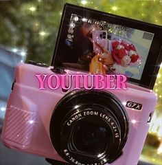 a pink camera with the words youtubeber on it