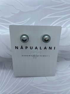 HINUHINU. Simple, smooth, shiny and lustrous. These beautiful almost flawless stud earrings are stunning! Save these for a special occasion, a special moment or for that special someone...One must always own a set of pearl earrings, why not be a pair of gorgeous Tahitian pearls... Earring posts are 14K gold-filled with florette backings and also include silicone backs for additional security and comfort. Pearls are approx. 10.8mm. Each piece from my collection is handmade, designed and crafted b Classic Tahitian Pearl Earrings For Gift, Classic Tahitian Pearl Earrings As Gift, Classic Tahitian Pearl Earrings For Anniversary, Tahitian Pearl Necklace, Peacock Pearl, Vertical Bar Necklace, Kailua Kona, Earring Posts, Tahitian Pearls